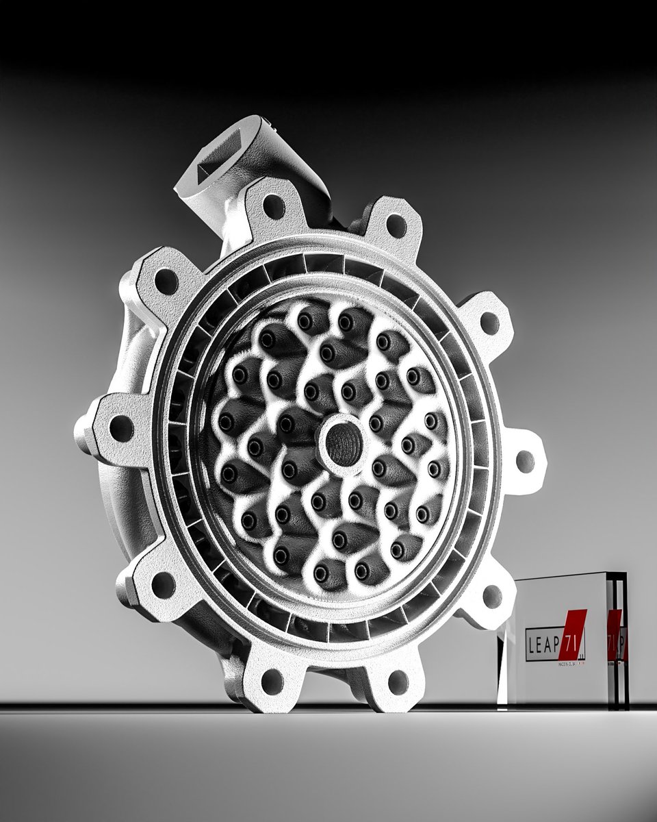 leap_71's tweet photo. Injector head for a 28 kN MethaLOX rocket engine designed by Noyron Large Computational Engineering Model. Coaxial swirl injector elements and central torch ignition port. Ox-inlet on the side, methane supplied by the cooling channels from the combustion chamber. https://t.co/5X3Suf3kHt