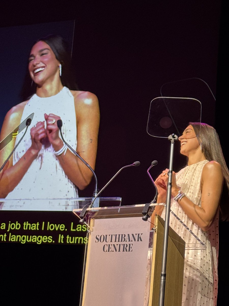 Burtini's tweet photo. I was fighting for my life with the auto-prompter but Dua Lipa last night at the International Booker Prize 10th Anniversary - I was not prepared for how beautiful she is in person! https://t.co/lg1Xvzscxe