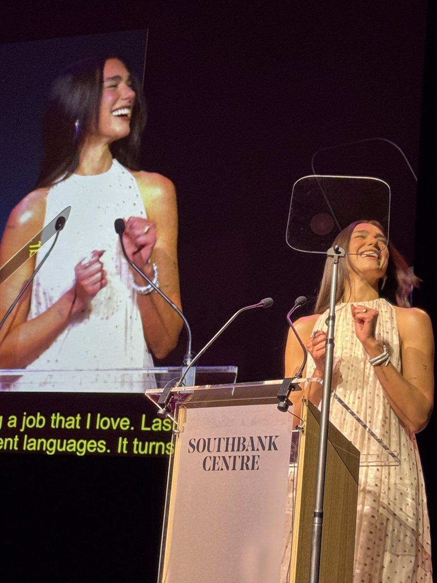 Burtini's tweet photo. I was fighting for my life with the auto-prompter but Dua Lipa last night at the International Booker Prize 10th Anniversary - I was not prepared for how beautiful she is in person! https://t.co/lg1Xvzscxe
