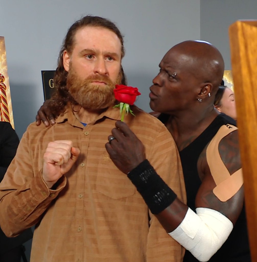 WheresCarmella's tweet photo. "tonight was very eventful had to comfort Sami for the loss of his gingerbread cousin it's hard out here dawg like a jolly rancher &amp; then my buddy priest got ambushed by Talanoa Hatonga! I had to save him ain't nobody gonna beat up my BDSM undertaker partner! That's wassup!" https://t.co/uLSKFJIKM5