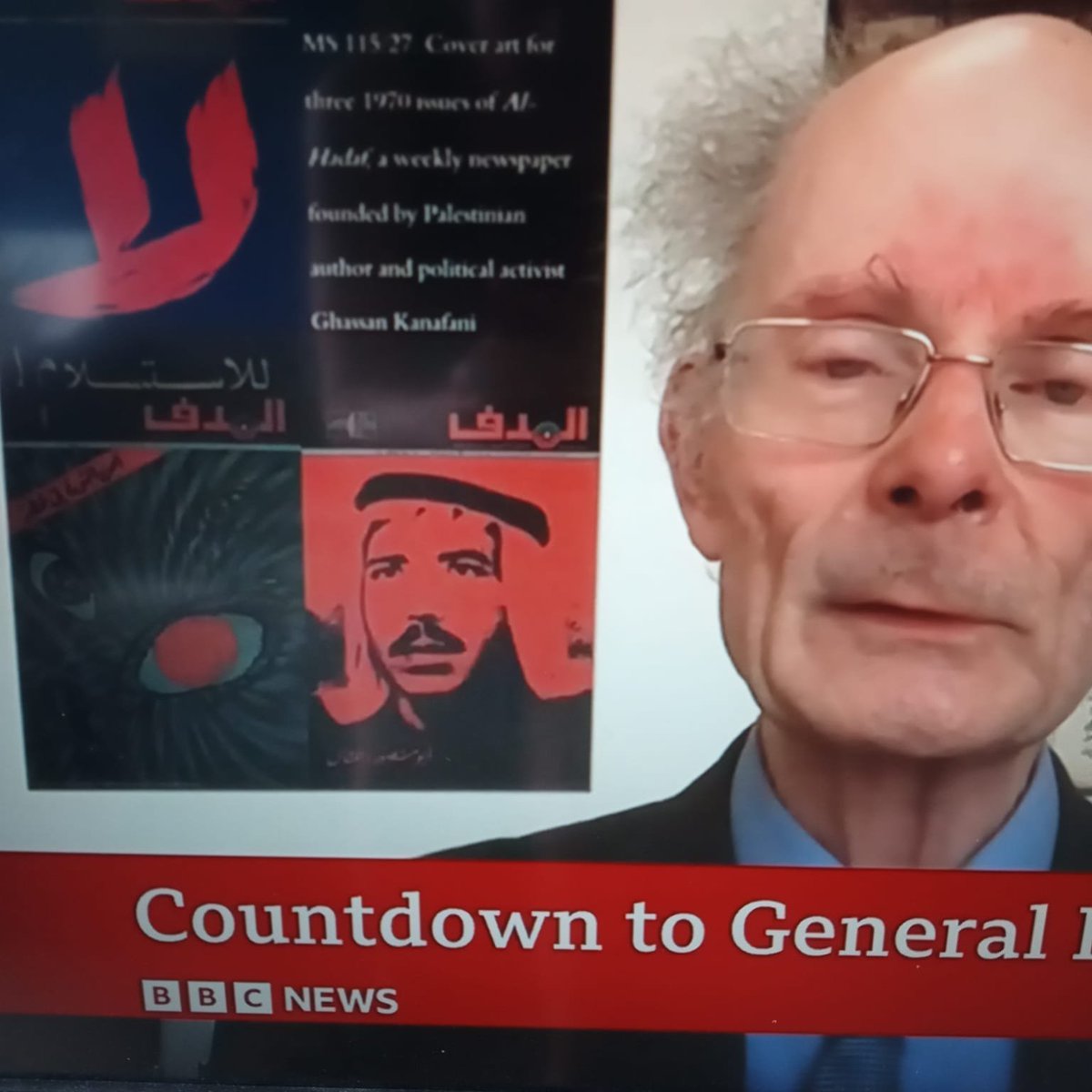 PhilipProudfoot's tweet photo. My favourite John Curtice moment was when he once appeared on BBC, and there was poster from Al-Hadaf on his wall, the Marxist-Leninist Palestinian magazine started by the writer, poet, and revolutionary Ghassan Kanafani https://t.co/RA5kQz9cVy