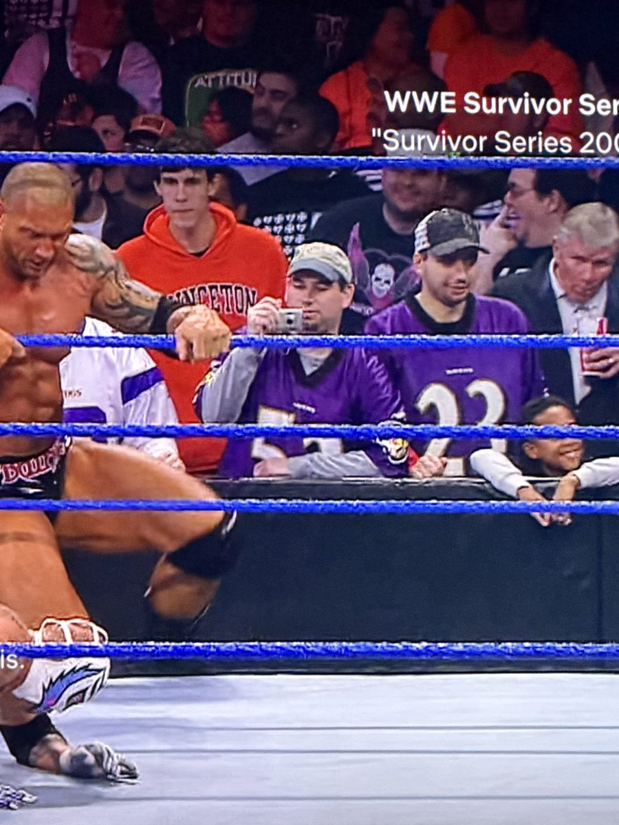 wtfsulo's tweet photo. Wait a damn minute. I’m watching Survivor Series 2009 and guess who’s front row, green shirt guy… in a purple shirt. @SuperfanSmilez https://t.co/rW1FdAmJvi