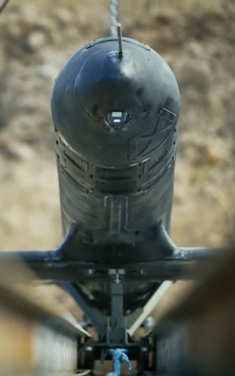mixedstrategy's tweet photo. Russia’s parade featured a Geran-5 promo video of launch rail system. Here’s a few screenshots featuring TELEFLY TF-TJ2000A turbojet engine mounting assembly and an interesting closeup of hardware additions to the nose cone https://t.co/8i28pNHXFB