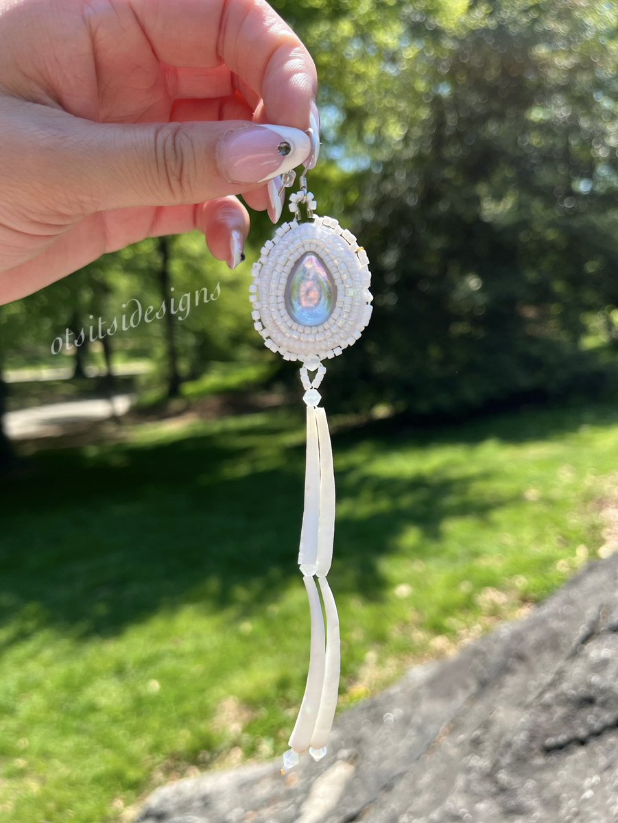 otsitsidesigns's tweet photo. me and my sister travelled to nyc last week so i snapped these pics of my earrings in central park! watkathohsliyó 🐚🤍🕊️✨✨ https://t.co/jtCoO24Pxs