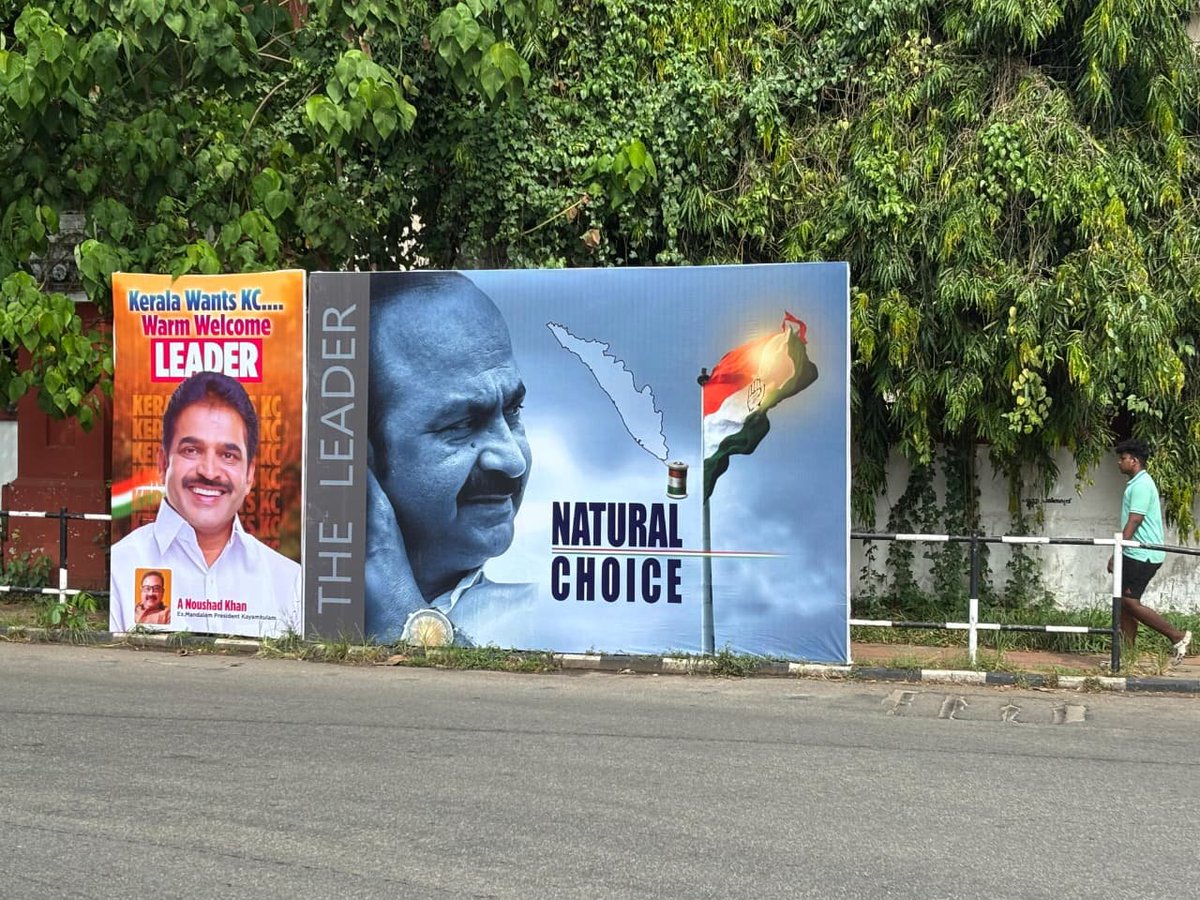 ClickMuni's tweet photo. Fierce CM chair fight in Kerala! KC Venugopal lobbying hardest... the guy who isn't even an MLA.

Nothing says "people's choice" like demanding CM without winning a seat. High command > democracy, right? #KeralaCMRace #CongressLogic https://t.co/WwgFmEgmLV
