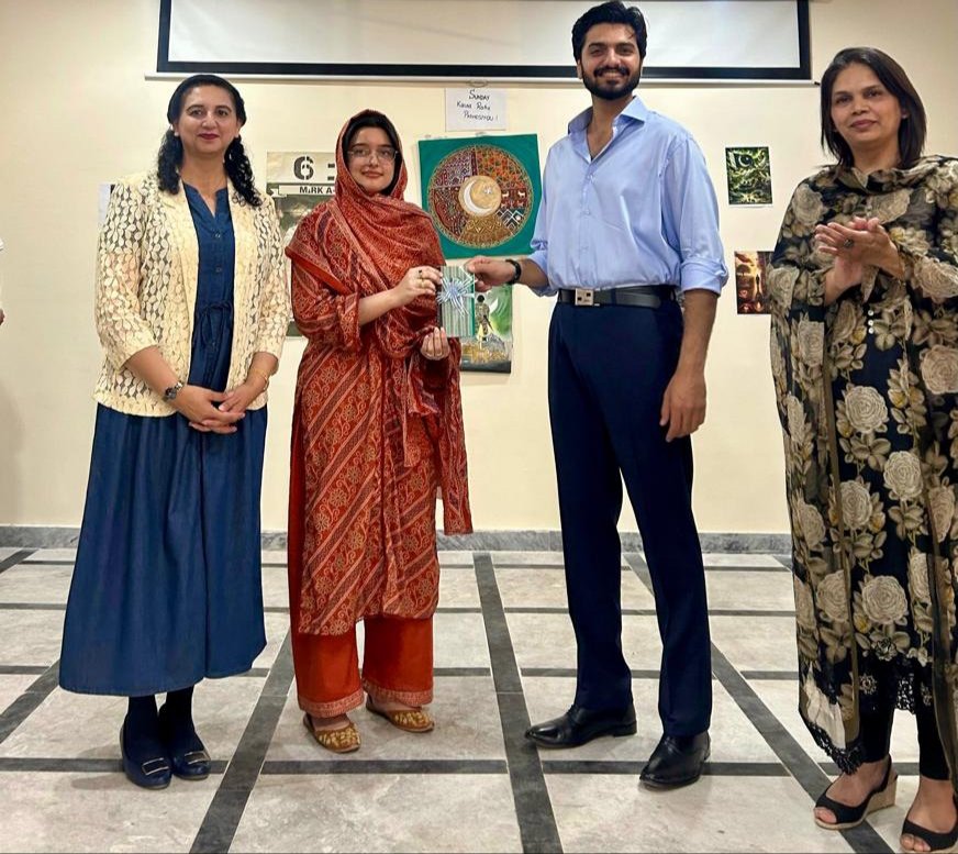QAU_Official's tweet photo. To celebrate the spirit of Marka-e-Haq, Quaid-i-Azam University organized a week-long series of activities highlighting patriotism, creativity, and resilience. The Department of English, with the support of the Quaidian English Society, held the “Marka-e-Haq: The Victorious Spirit of Pakistaniat” Painting & AI-Based Content Competition, where students expressed themes of truth, courage, and national pride through creative and AI-based works. 

Arooj Ali secured first position, followed by Adnan Khan, while Ali Munaf, Ezza Mustufai, and Zonaib Fatima were also recognized for their contributions. The celebration reflected the national spirit associated with Operation Bunyan-um-Marsoos and Pakistan’s resilience during the May 2025 conflict @zafar_jaspal