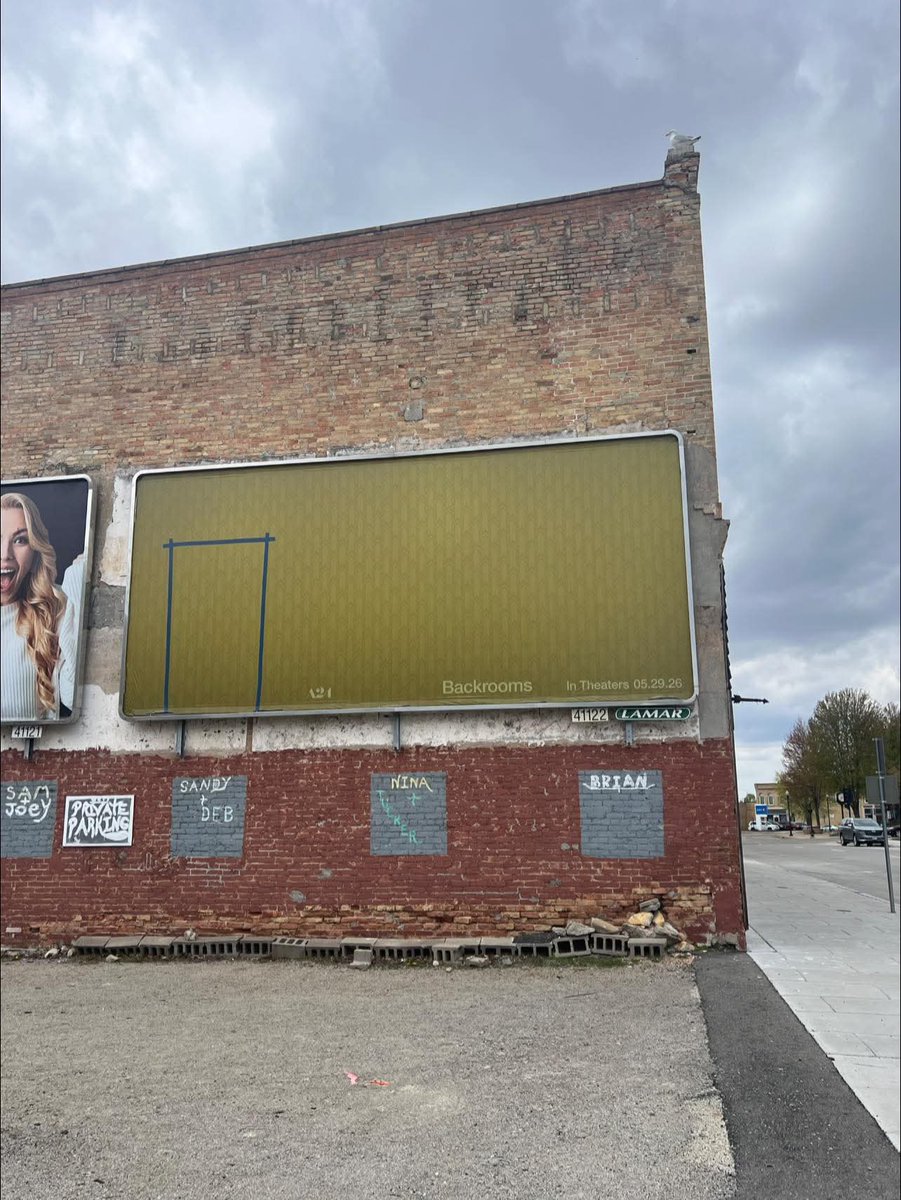 FinalAntiFaXIV's tweet photo. They put a Backrooms billboard up in Oshkosh, WI but they didnt put it on the actual backrooms building https://t.co/DUHnLW3PHy
