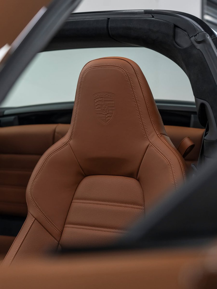 speedfreakshow1's tweet photo. This color on the 911 Targa 4 GTS is something else. 🍫That roof. That leather. That presence. https://t.co/RVWEQTmtVH