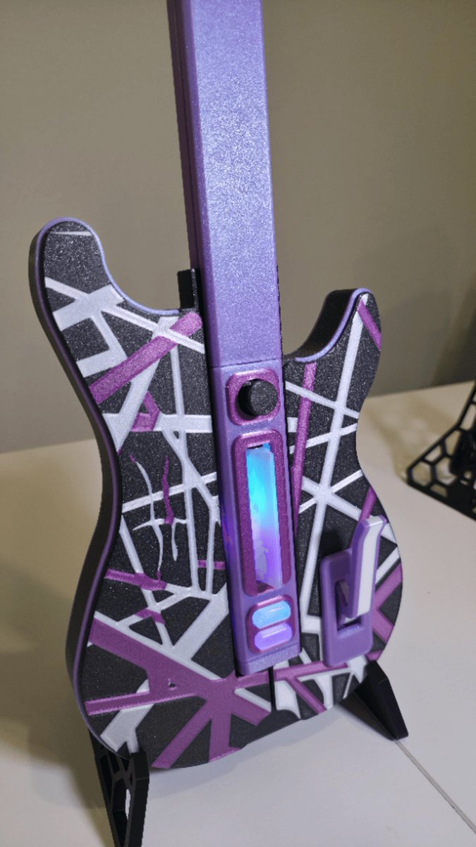 PrintingPilot's tweet photo. Fully 3D printed Polybar system is coming together! 🎸 Open-source DIY rhythm game controller, printed parts, custom electronics, and a build that actually feels awesome to play.
Built two guitars — one for me and one for my wife.
#Polybar #CloneHero #GuitarHero #3DPrinting #DIY https://t.co/B7Oe03Zlvl