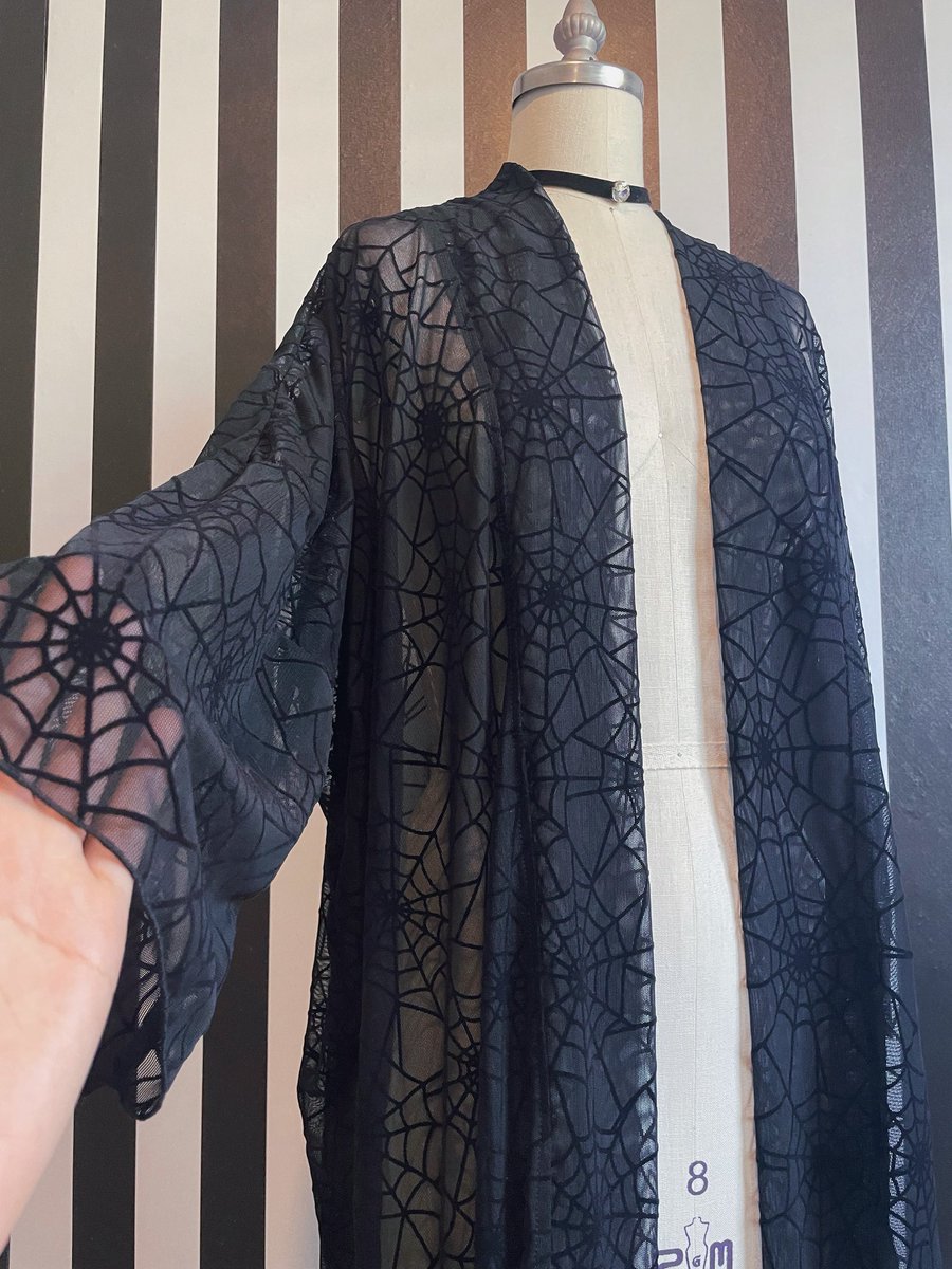 minanohime's tweet photo. Spider Web duster im debuting next month for @hellzbellesco 🕷️🕸️🖤 https://t.co/0FMyx9vXke