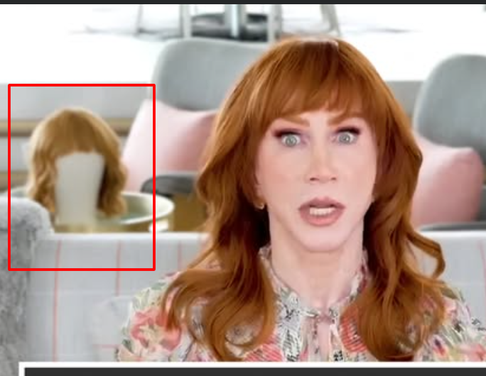 This is some of the strangest behavior I've ever seen.

She put this head here on purpose as a prop.

It's facing her. She's got it rotated so that it is looking at the back of her head.

What is going on in her mind?