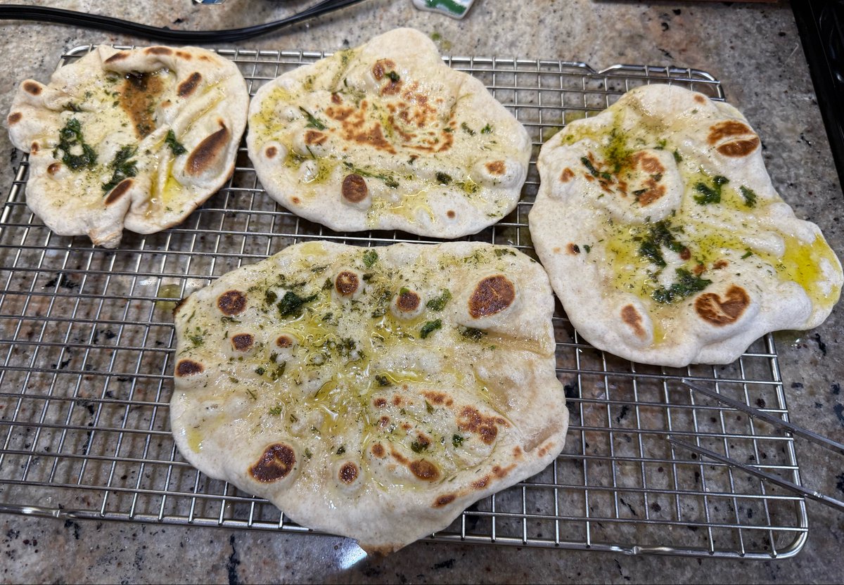 nickwritesit's tweet photo. I made garlic and herb flatbread to go along with butter chicken and steamed cauliflower. Surprisingly doable! https://t.co/GhI0ZRs4pn