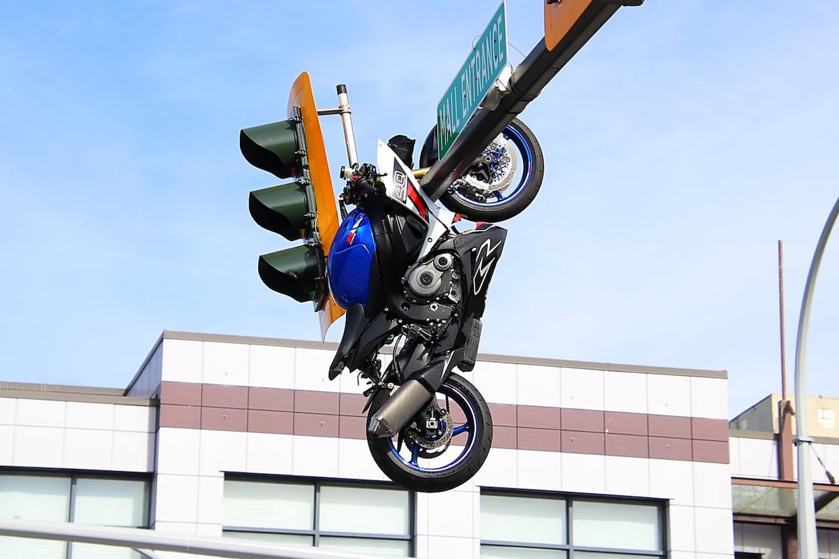 BREAKING NEWS 🚨🚨

Photos show the motorcycle suspended above the roadway from an overhead traffic signal pole following the crash.

Motorcyclist seriously injured after crash leaves bike dangling from traffic light.

Police say a motorcyclist was taken to hospital with serious