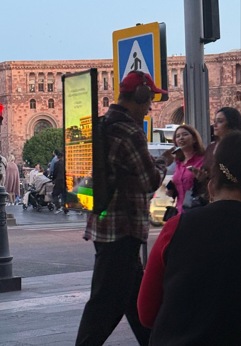 Lordmiles's tweet photo. In Armenia, Indians are used as walking billboards with a TV and battery strapped to their back 😭 https://t.co/lqRgooy71q
