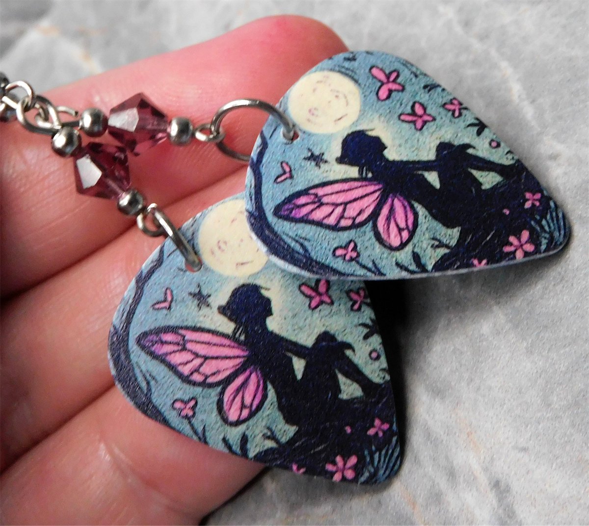 SimplyRaevyn's tweet photo. These guitar pick earrings look like they are hand illustrated. Very lovely and very magical.

https://t.co/isxwmovzQ6

#mhhsbd #smallbusiness #womanownedbiz #womanowned #shopsmall #supportsmallbiz #fairy #fairies #cottagecore #fairycore https://t.co/OlsMBed3a4