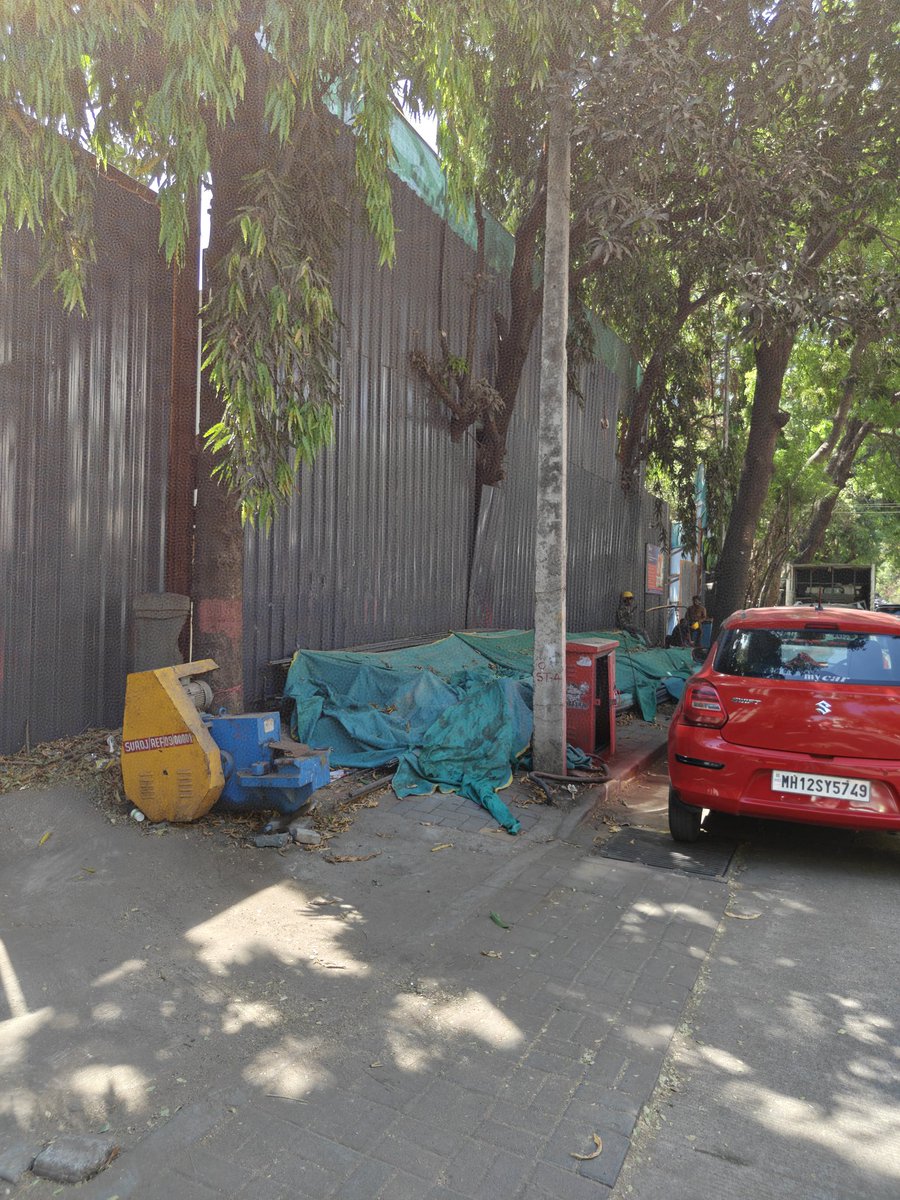 jayantd98300514's tweet photo. Since November 2025, this developer is happily using the footpath. Pedestrians are endangering their lives. @PMCPune continues to ignore this for 6 months now. This is disgusting @navalMH @MDNagpure https://t.co/164c1jAisZ