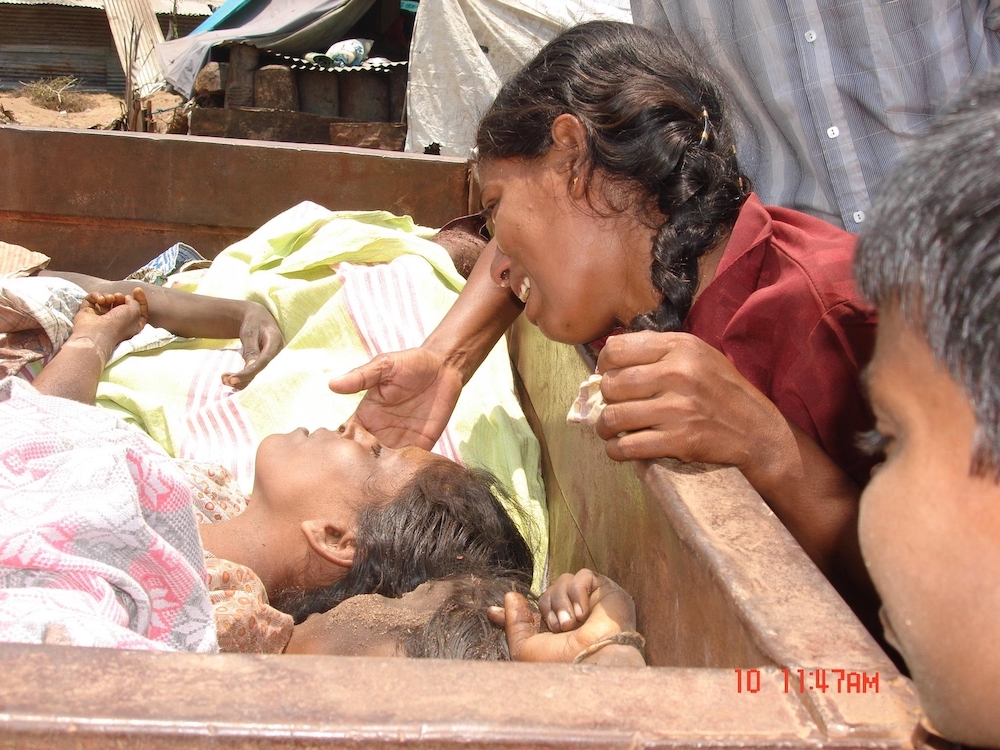 TamilGuardian's tweet photo. 🔴 17 years today - Thousands killed in one day 

As many as 2,000 civilians were reportedly killed in a barrage of artillery fire by the Sri Lankan military throughout the day, reports TamilNet.

“Dead bodies are found in bunkers and inside the tarpaulin tents,” TamilNet added.

https://t.co/c1Lsr1IfD2