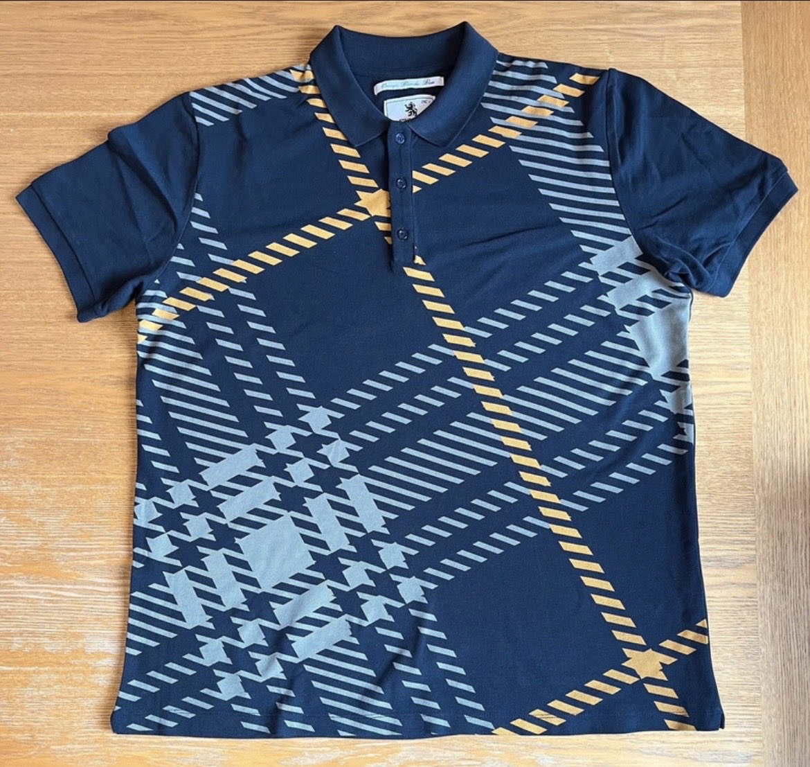 garygalb's tweet photo. @adiFamily_ King of Orange Navy Polo Shirt with hatched grey &amp; orange tartan design. 

Size XXL 24.5 inch Pit to Pit. 

Worn once as new from smoke/pet free home.

£15 delivered. https://t.co/OgqV8AlD0i