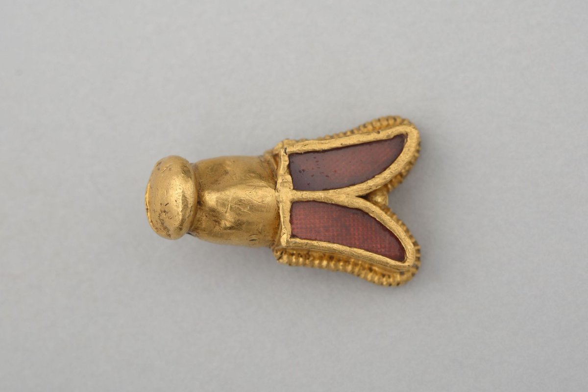 this is an allusion to the golden bees found in the tomb of Childeric I .

Donald, the longhaired king...