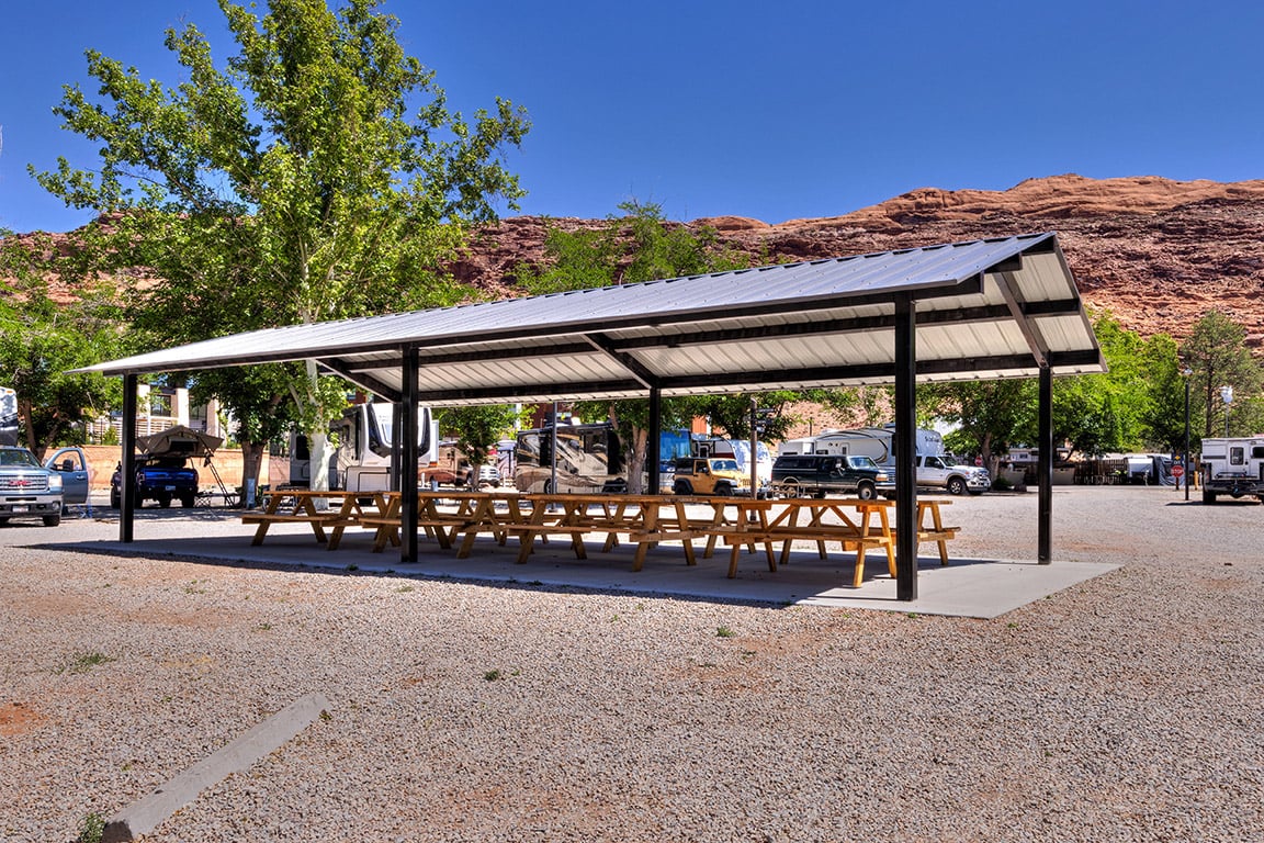 PlayRelaxLive's tweet photo. Anyone going on spring break to Moab, Utah? Take a look at this 20' x 40' Gable End picnic shelter we installed at Sun Outdoors. It's giving picnic with a view vibes. See more photos: https://t.co/PczDHYWU27 https://t.co/mD3EdWLyc2
