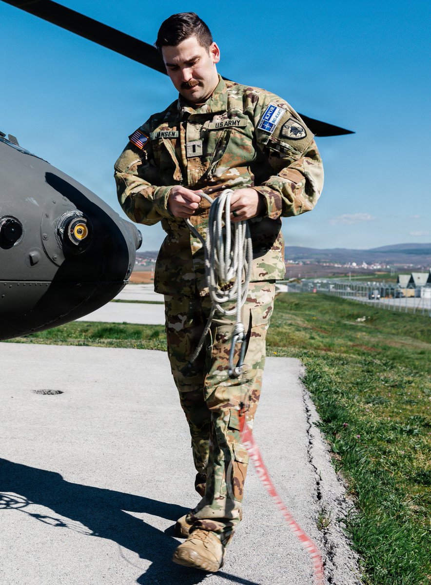 CONG1860's tweet photo. CONG's own 1LT Jansen, assigned to NATO Kosovo Force, is carrying on family tradition, flying with an American flag given by his father. This flag has been carried by members of his family during their deployments it serves as a symbol of shared commitment to military service. https://t.co/OUw1tOMGEB