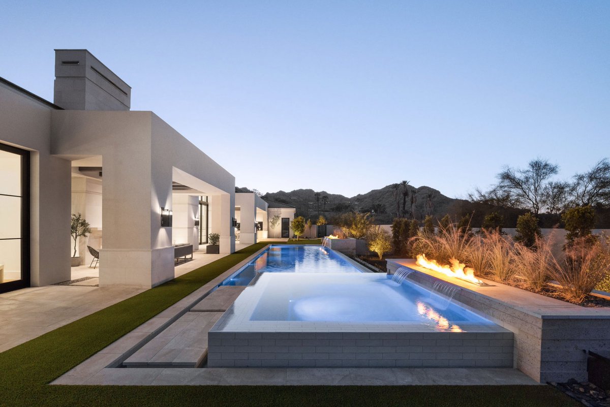 BedBrockDev's tweet photo. There is a rare kind of home that feels both timeless and entirely of the moment. 𝗛𝘂𝗺𝗺𝗶𝗻𝗴𝗯𝗶𝗿𝗱, nestled in Paradise Valley, is exactly that. Mediterranean warmth and contemporary precision woven into every detail, from the aged brass kitchen accents to the Carrara marble spa suite. A 64-foot lap pool, private theater, and indoor-outdoor living spaces complete an estate designed for those who expect everything.

Builder: BedBrock Developers
Architect: Stratton Andrews
Interior Design: George Oliver Design Group