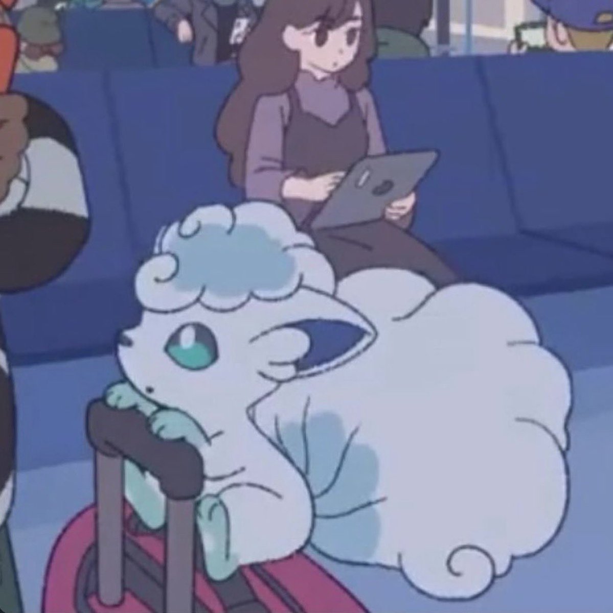 Vulpix clinging onto a luggage bag!