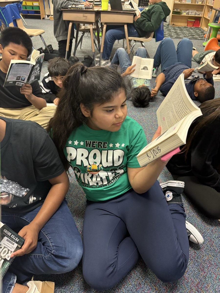KDavis_5K's tweet photo. When chapter books replace Chromebooks, itโs a good day. #pushingpaper #paperandpencils #readaloud #wildrobot @itspeterbrown https://t.co/rvUFcMJ4Rn