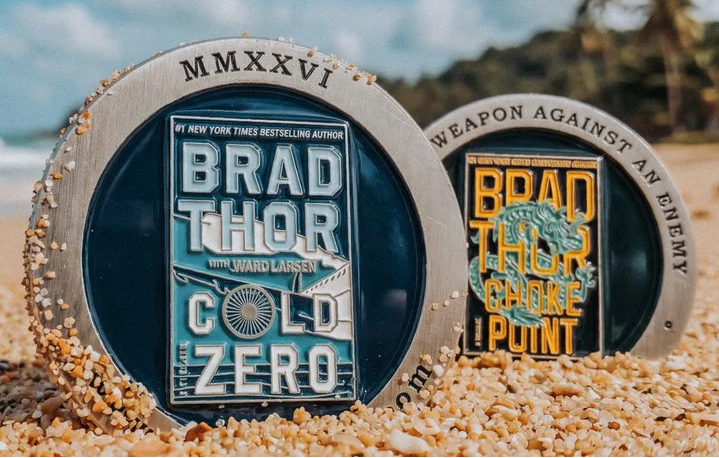 HashtagSpiruli's tweet photo. Gorgeous! @BradThor / @wardlarsen book & new #Scotharvath book challenge coins. #amreading #Thrillers #BookX https://t.co/WsfR24zWg4