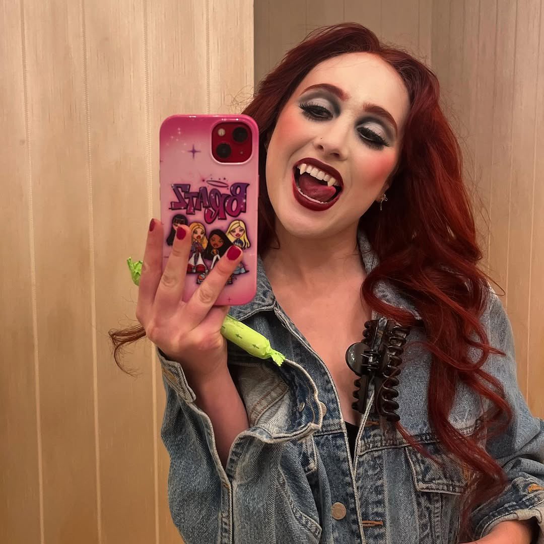dailyroan's tweet image. three years ago today, chappell roan shared a selfie from behind the scenes of the ‘red wine supernova’ shoot to instagram! 

“someone help this woman she’s gone girl crazy ‼️🚨‼️🚨 #help #her”

april 28th, 2023