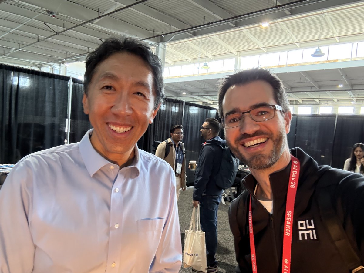 Koukoumidis's tweet photo. I just met @AndrewYNg  at AI Dev—and something about the interaction stuck with me.

Despite everything he’s achieved, he was humble and helpful connecting me with his team in the same pleasant, calm, and soothing voice he is also known for.

Being here at AI Dev, you can feel that shift. The conversations aren’t just hype—they’re getting more practical, more grounded.

If you’re around, come by booth #511—we’ve been demoing Oumi’s VibeML and the response has been great.

Also, tomorrow at 5pm, Stefan and I are presenting:
“VibeML: Build your specialized AI model from a prompt – in hours, not months”