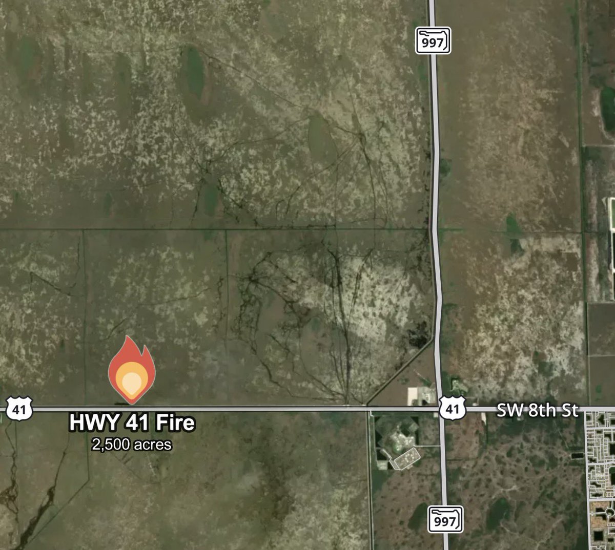 MiccosukeePD's tweet photo. HWY 41 FIRE | South of Tamiami Trail
A wildfire is burning south of US-41, spanning over 2,500 acres. Multiple agencies are deploying aerial resources to drop water and protect structures in the area.

Heavy smoke is expected along Tamiami Trail tomorrow. https://t.co/klFWLt0Bje