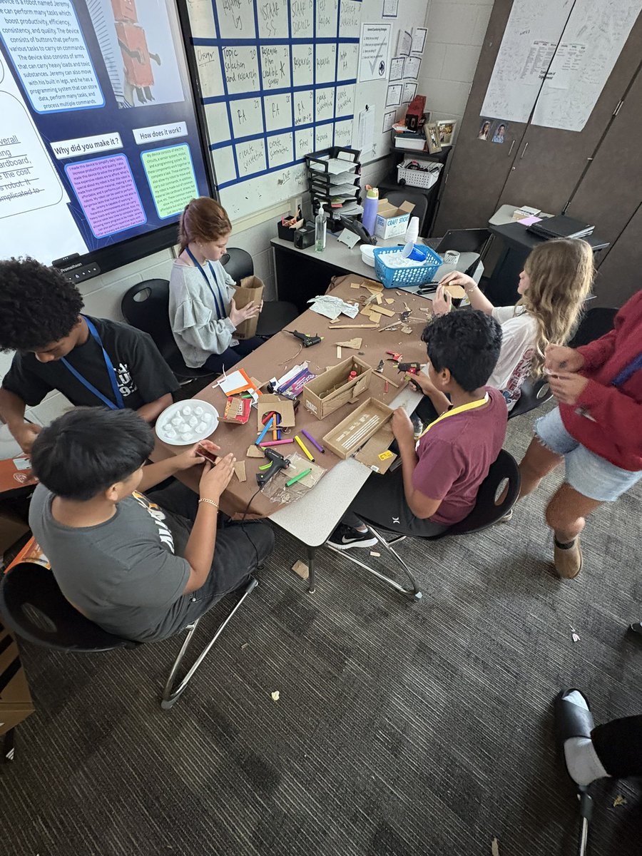 MrsLandgrafAMS's tweet photo. Eighth grade Ravens working hard in language arts, creating the invention portion of their research project. @mrs_romanelli @DrAnthonyMS https://t.co/15vSazXXXE