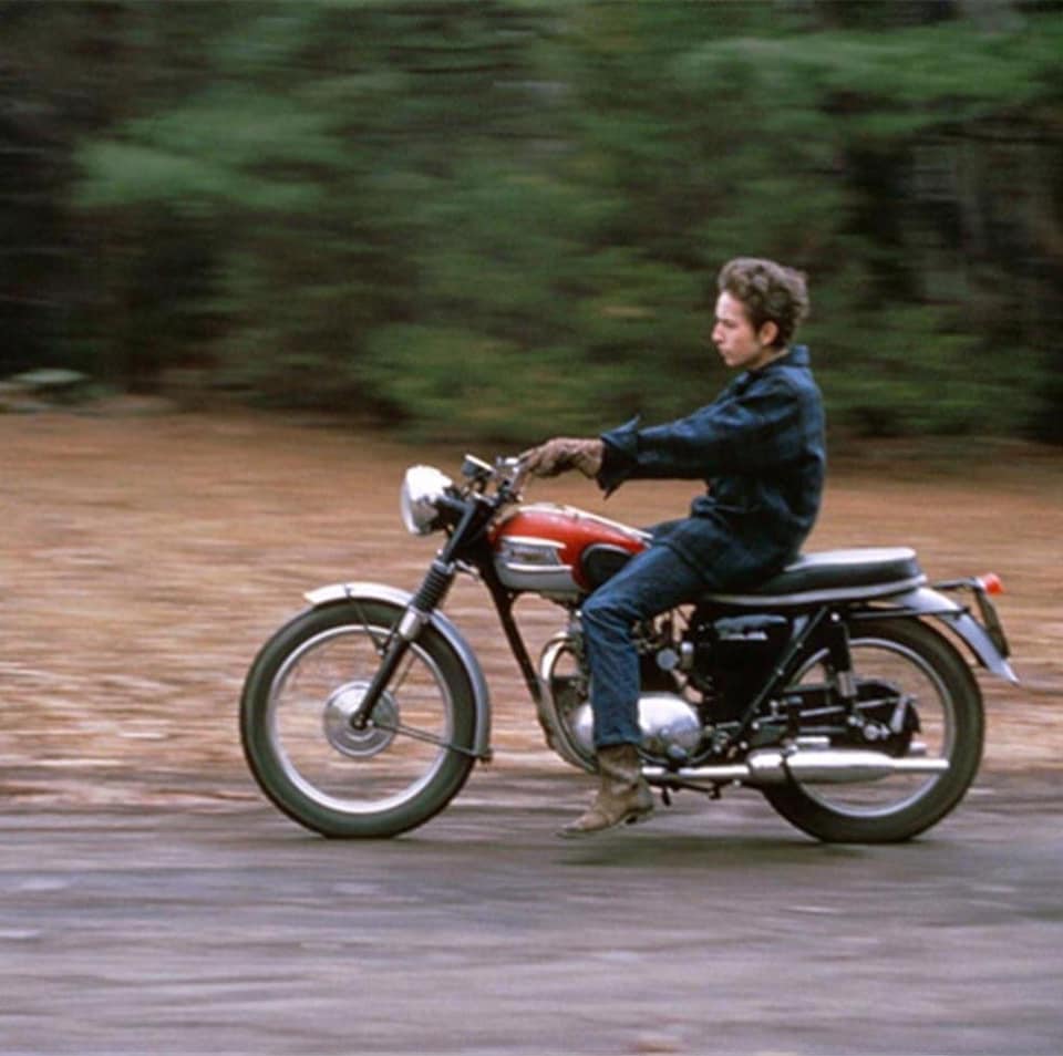 pastarchive's tweet photo. Bob Dylan riding his Triumph motorcycle near Woodstock, NY (1966). https://t.co/eo485S9hID