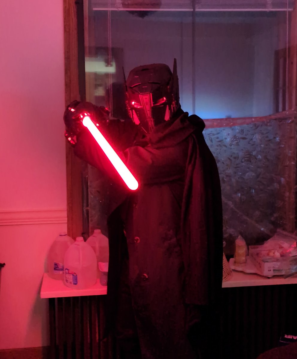 Operator_Dirge's tweet photo. Testing out my OC Sith cosplay for the first time!

Meet Darth Perilous.

Special shoutout to #graystarinnovations for the amazing helmet! Definitely check them out for your next sci-fi/cyberpunk cosplay project.

https://t.co/75Jk4EEZmt https://t.co/WARuJtA6PK