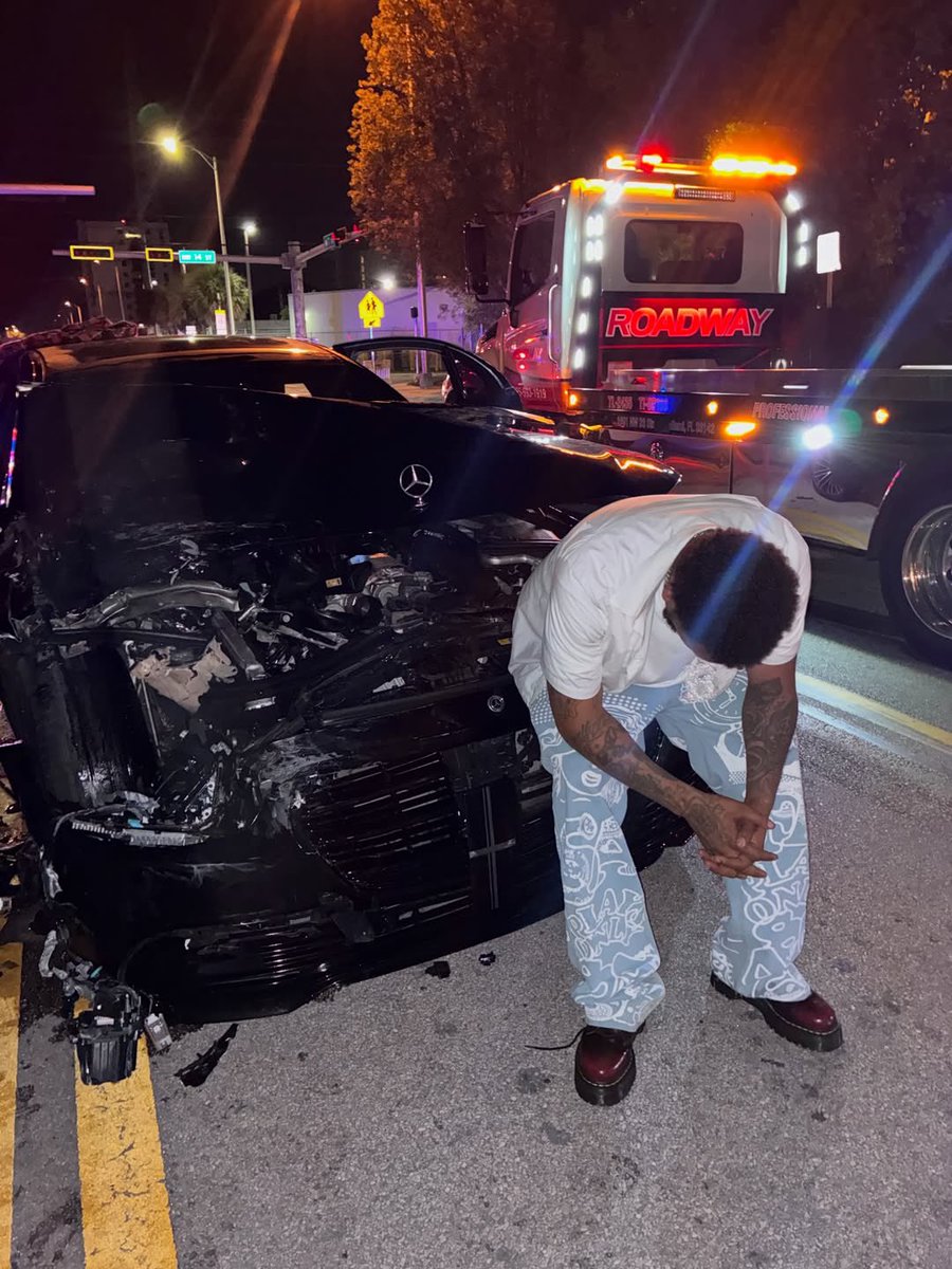 TRIGGERHAPPYV1's tweet photo. This man took one last photoshoot with his Mercedes Benz after totalling it in a serious crash and thanks god for protecting him https://t.co/DFtXd2yS2S