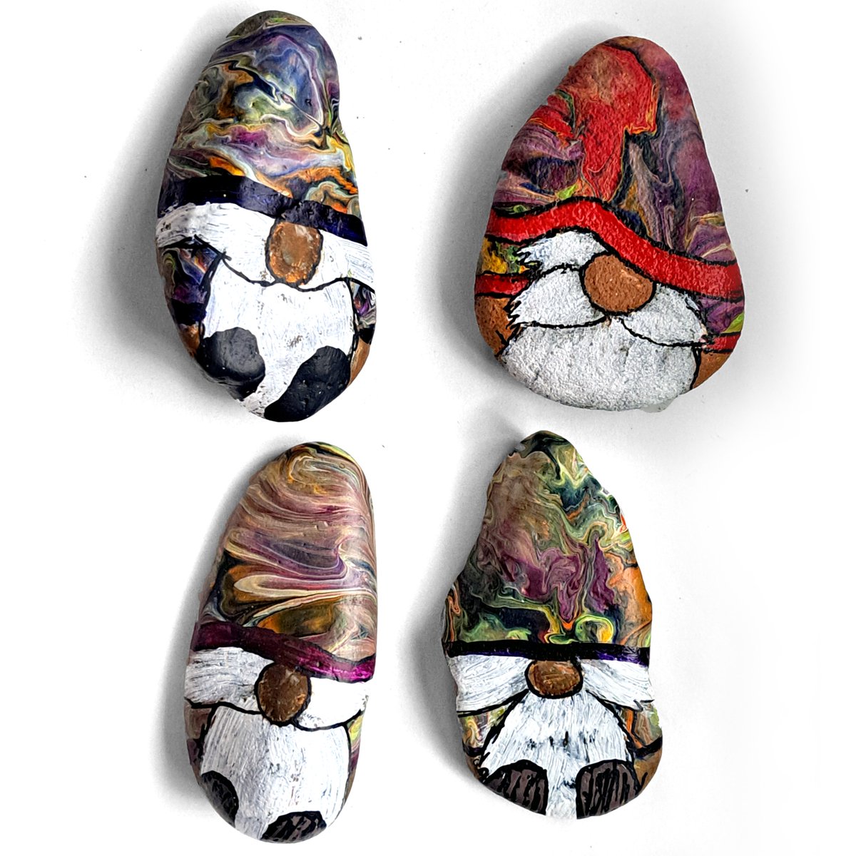zenbreeze's tweet image. Finished these 4 gnomes.  I painted all the hats and sleeves from a cup of pour paint, then did the details today.  JIC there's someone out there hoping I post more gnomes today :-).  #gnomes #rockpainting #paintedrocks #gardenart