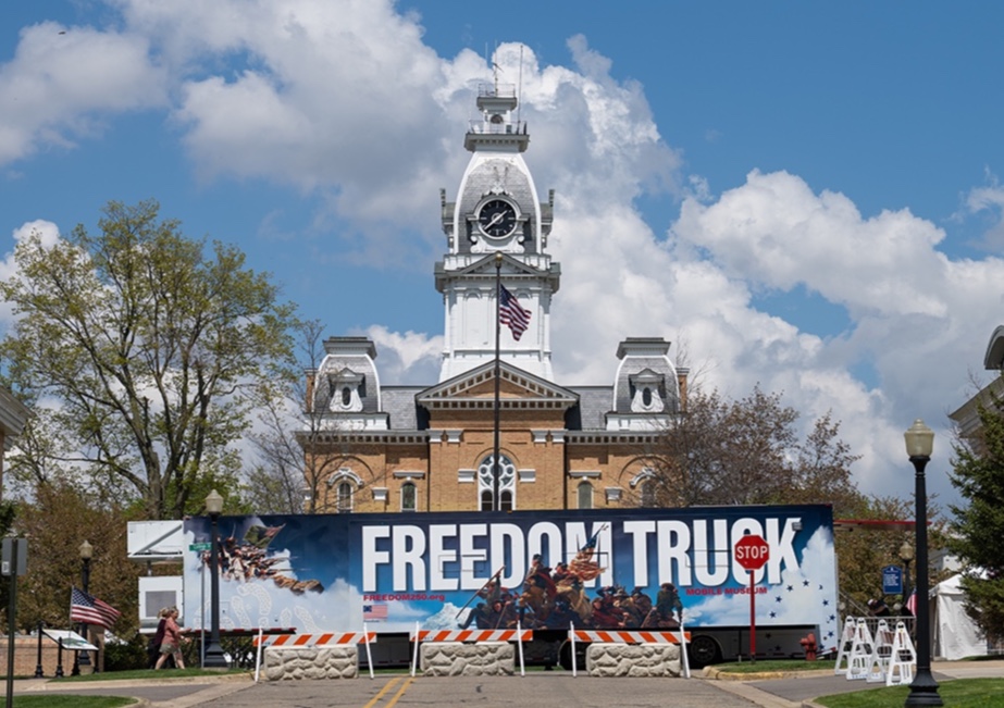 Hillsdale's tweet photo. Last weekend, our iconic campus transformed into the heart of an unforgettable three-day red, white, and blue celebration of America. 🇺🇸 From live entertainment and interactive history exhibits to family activities and a petting zoo, it was a hometown event worthy of America’s 250th birthday! 

A highlight of the weekend was the arrival of the Freedom 250 Freedom Truck, reminiscent of the Freedom Train of 1976, a mobile museum filled with powerful historical texts that brought America’s story to life in a unique and memorable way. Learn more at https://t.co/0LO5aXUG1T. ❤️🤍💙