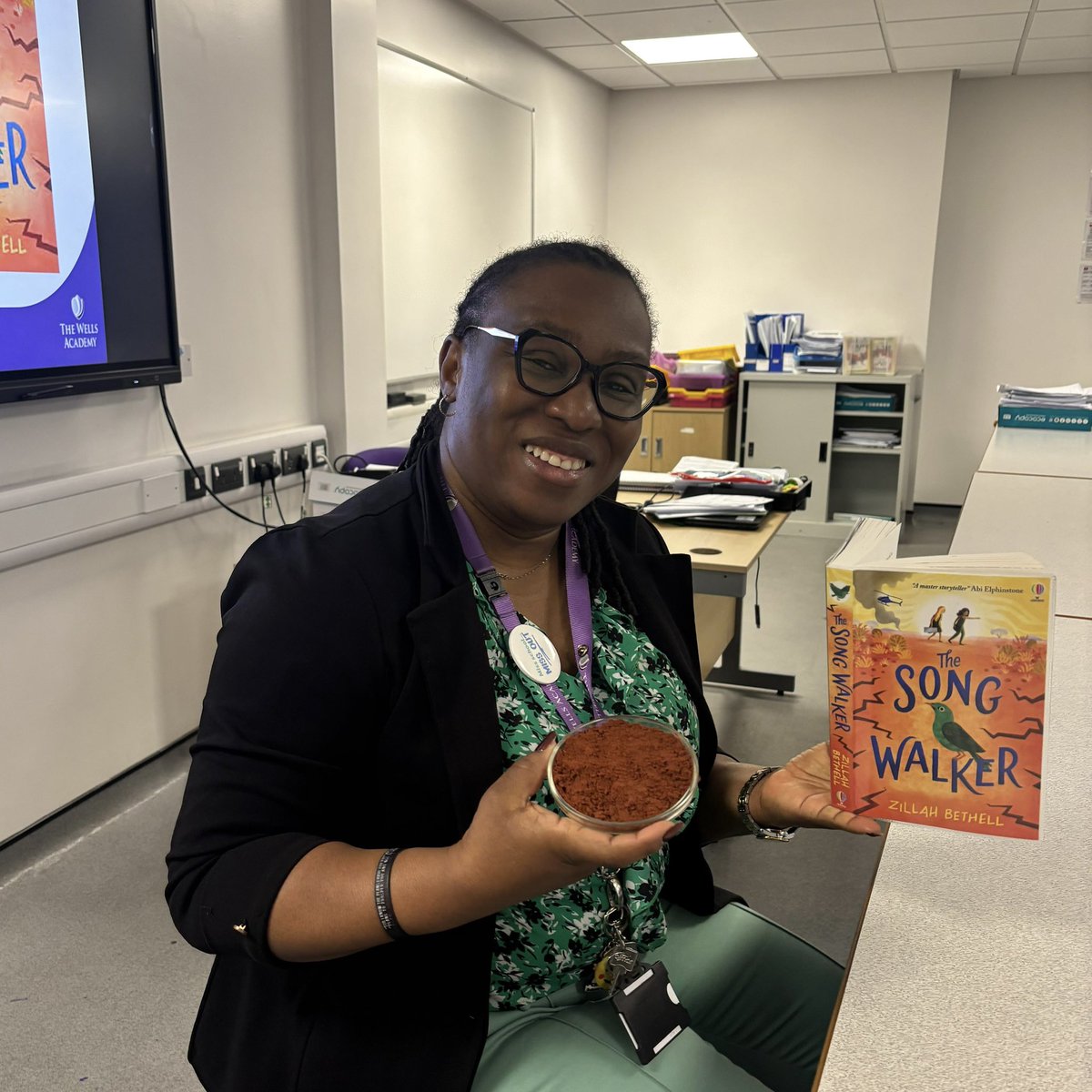 TheWellsAcademy's tweet photo. As part of our tutor reading programme, one of our Year 7 tutors, Ms Nosakare, used red sand as a way to give her students real context, helping them better understand the meaning behind the book, The Song Walker!

Great work, Miss! https://t.co/YcRD3pynTc