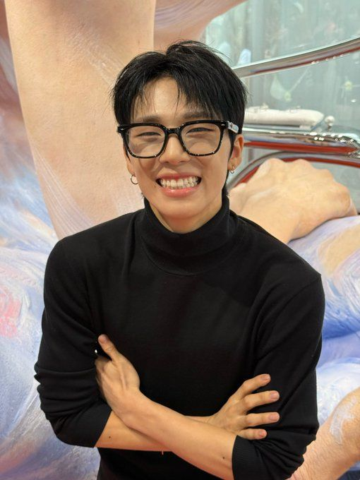 he smiles like his happiness is on the verge of exploding