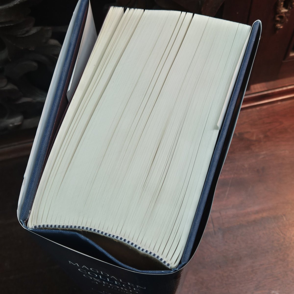 Sometimes with intsitutional and commercial histories, the physical form of the book can tell you almost as much as the contents about how the institution sees itself... herewith, at over 1000 pages and nearly 3.5" thick is the History of Magdalen College, Oxford.