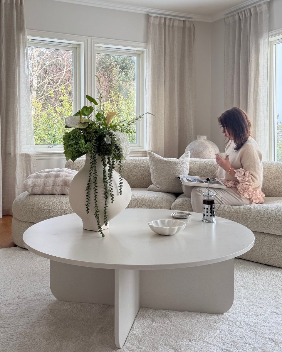 Silestone's tweet photo. A round table can completely transform the way a space is experienced. In this project, Silestone Linen Cream becomes the perfect focal point for a Scandinavian-inspired interior: clean lines, soft tones, and an aesthetic where less is more. https://t.co/FyaxOKmZ2V https://t.co/DpGqyzsaLX