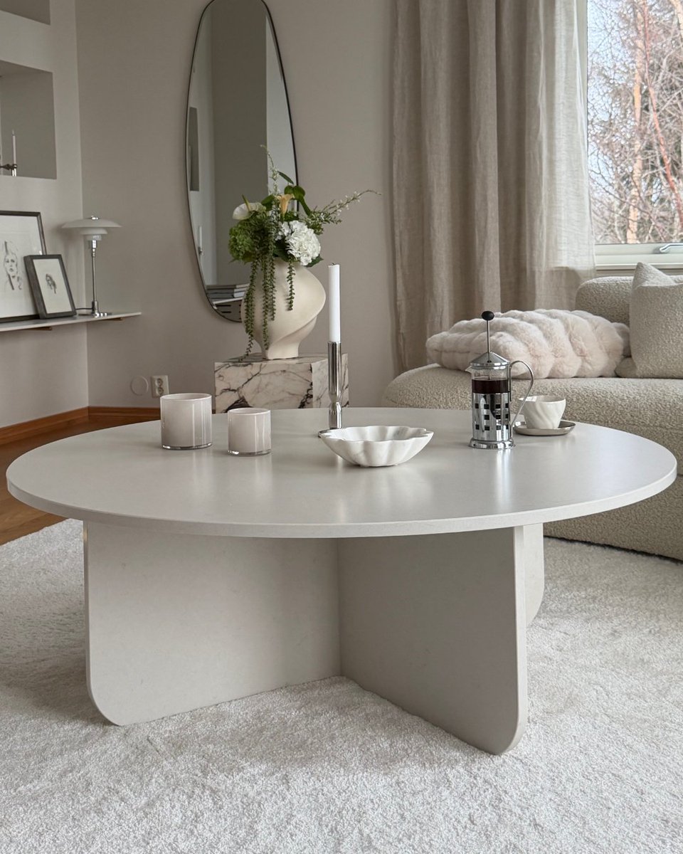 Silestone's tweet photo. A round table can completely transform the way a space is experienced. In this project, Silestone Linen Cream becomes the perfect focal point for a Scandinavian-inspired interior: clean lines, soft tones, and an aesthetic where less is more. https://t.co/FyaxOKmZ2V https://t.co/DpGqyzsaLX