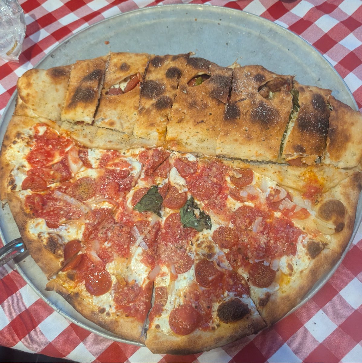 Nerdychick83's tweet image. So my work last night decided to make a pizza calzone for the "family pizza" for the food servers to share. It turned out pretty awesome and I wanted to show you what that looks like. 🥰❤️🤘😊🔥 #Grimaldis #Palazzo #LasVegas
