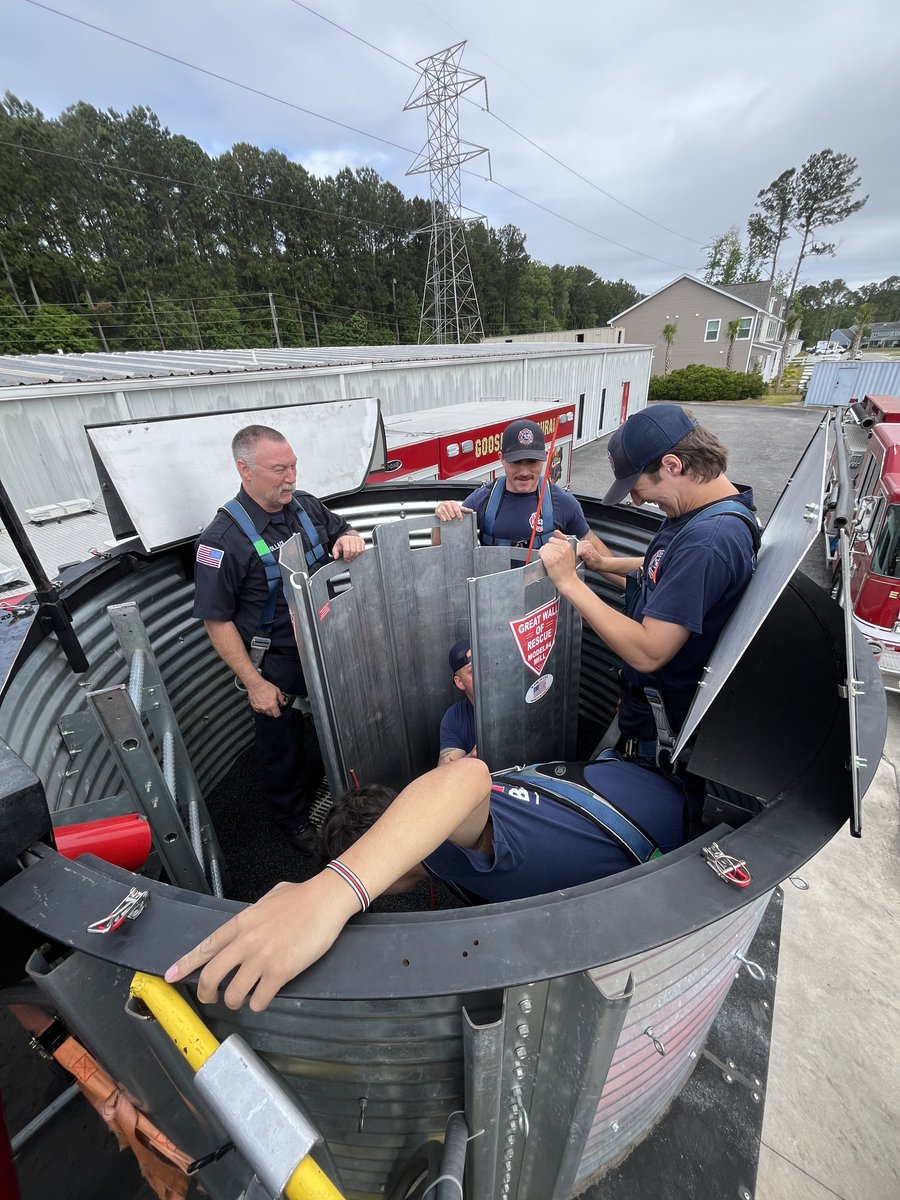 ClemsonAgSafety's tweet photo. Earlier this week, the Grain Entrapment Simulator traveled to Goose Creek Rural Fire Department, where personnel from Berkeley County received hands-on training on how to rescue an entrapped victim from grain or other bulk media. https://t.co/X8NhuPasmR