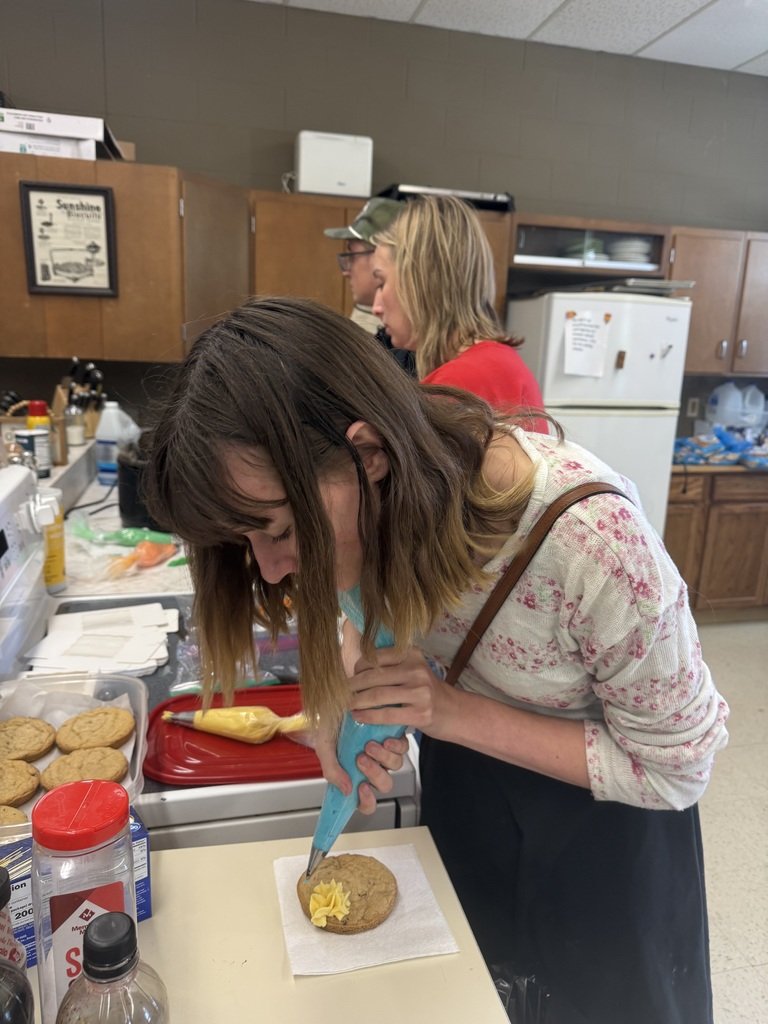 usd358's tweet photo. Culinary class learning to decorate cookes with Mrs. Moore. https://t.co/CcDg80SA8o