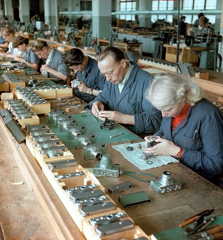 Assembly line at the Carl Zeiss factory in Jena, 1950s.