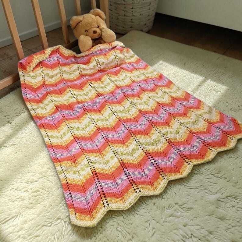 knittingtopia's tweet image. Add a pop of colour to your baby's crib or pram with this hand-knitted blanket in vibrant shades of orange, pink, and yellow. Its chevron pattern adds a charming touch. An ideal choice for a baby shower gift.
knittingtopia.etsy.com/listing/171511…
#etsy #handmade #craftbizparty #MHHSBD