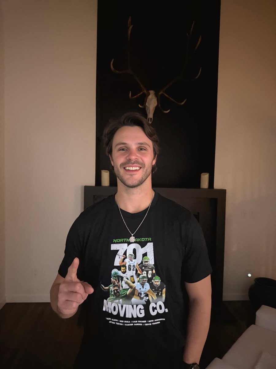 Gausmus47's tweet photo. I will be posting a Shirt of The Week once a week for the foreseeable future. 

Starting off week 1 a gift from a good friend @DrydenDragich, The 701 Moving Co. @UNDfootball 

If you see any of these gentlemen in the wild let’s make sure we pick up the tab and add extra protein. https://t.co/vyic6o1AsH