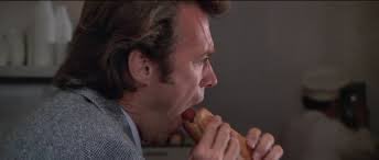 Inspector Harry Callahan absolutely throating a hotdog
